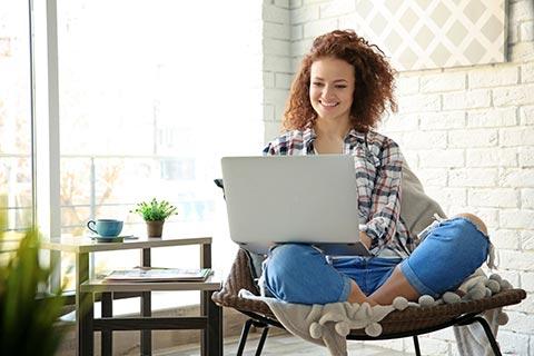 Young Woman using Laptop